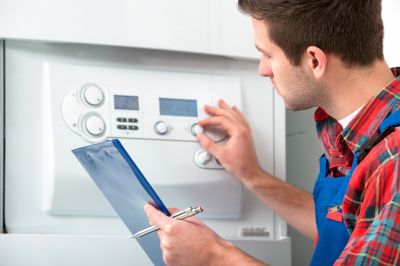 Technician performing boiler tune-up